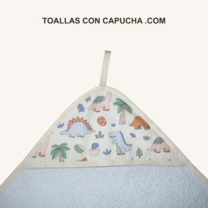 Detalle toalla con capucha dinos grandes para bebés y niños