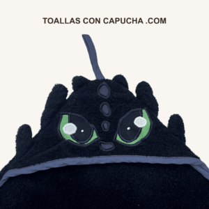 Detalle toalla con capucha dragón para bebés y niños